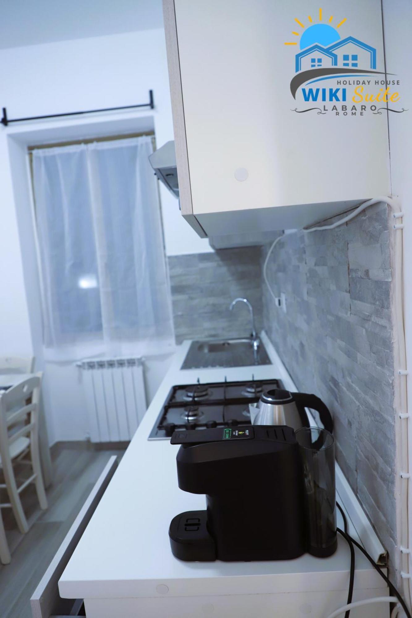 Wikisuite Labaro Apartment *