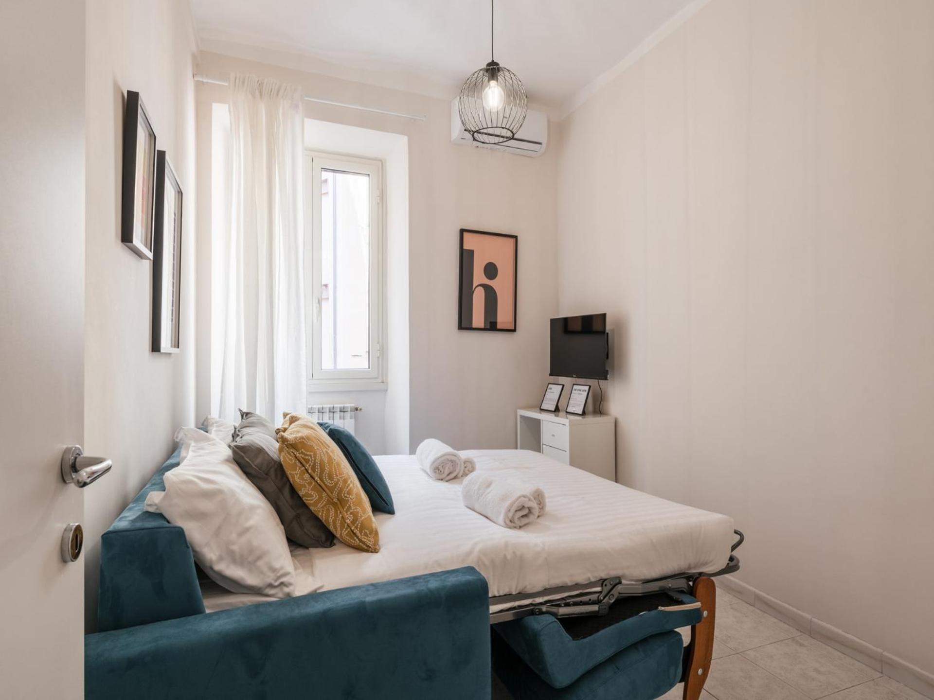The Rent - Spacious One-bedroom Near Colosseum *